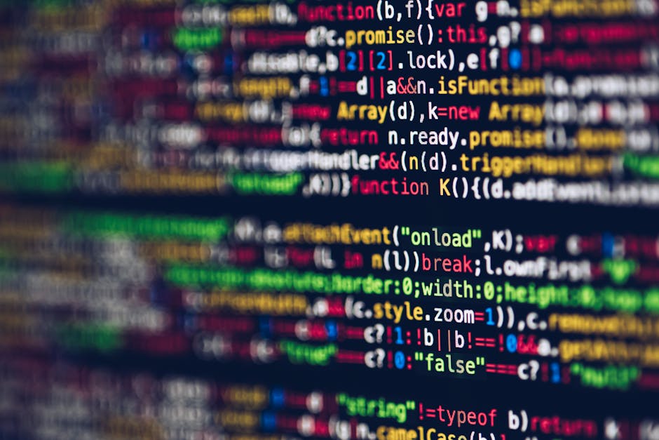 A photograph of a computer screen displaying lines of HTML code in various colors, including red, green, and white, on a dark background. The code appears to outline the structure of a website's navig